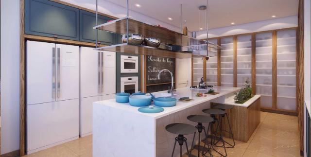 Cozinha planejada com ilha central, todo chame da combinação de cores e arranjos de móveis.