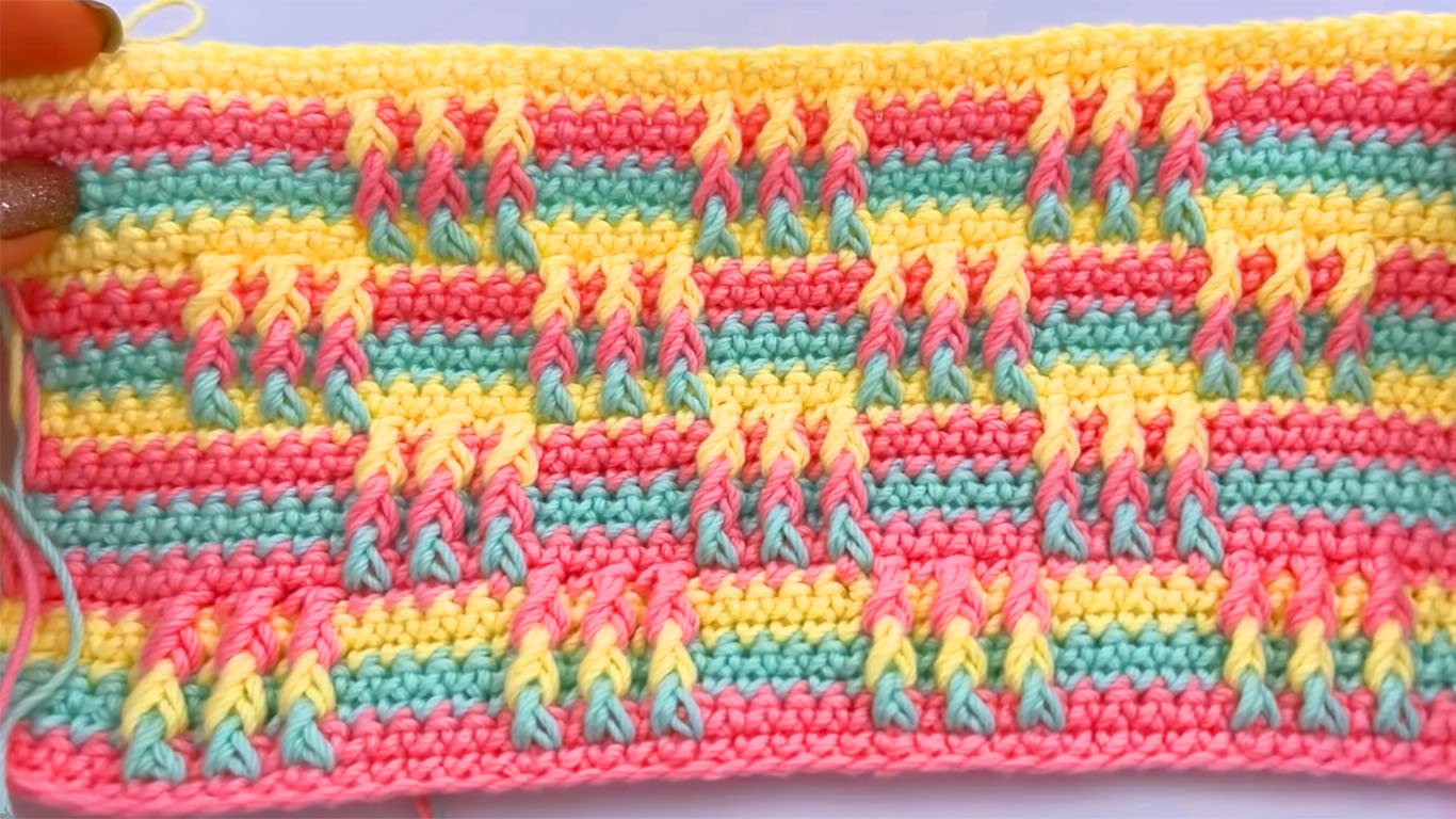 Elegante ponto de crochê trançadinho bem fácil de aprender e aplicar, tanto colorido como neutro